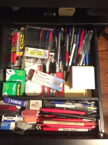 Drawer packed full of pens